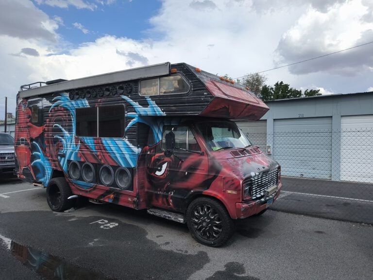 A custom painted Burning Man art van parked at Linden Mini Storage